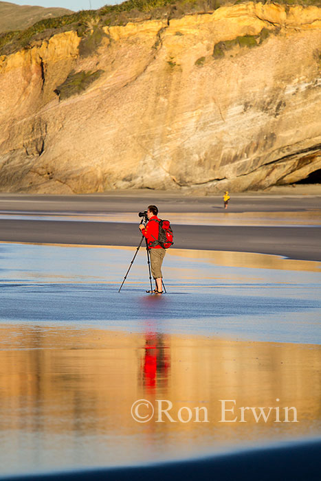 Photographer on Wharariki Beach, NZ