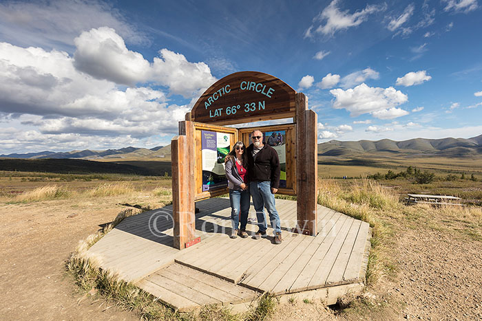 Ron and Lori at the Arctic Circle sign in the Yukon Ron and Lori at the Arctic Circle sign in the Yukon