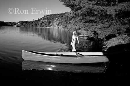 Nude in Water by Canoe