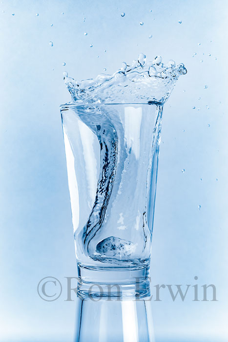 Stones Splashing into Glass