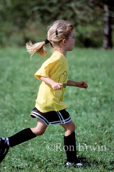 Girl Playing Soccer