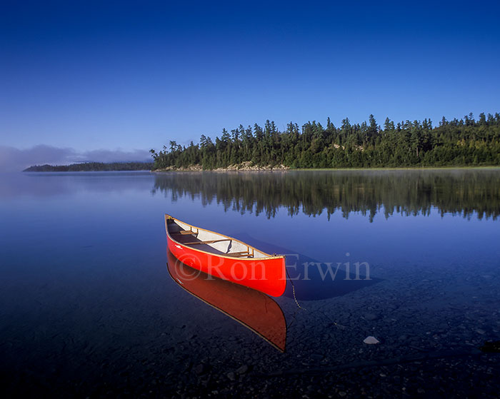 Floating Red Canoe