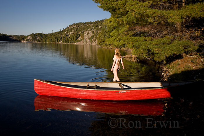 Nude in Water by Canoe