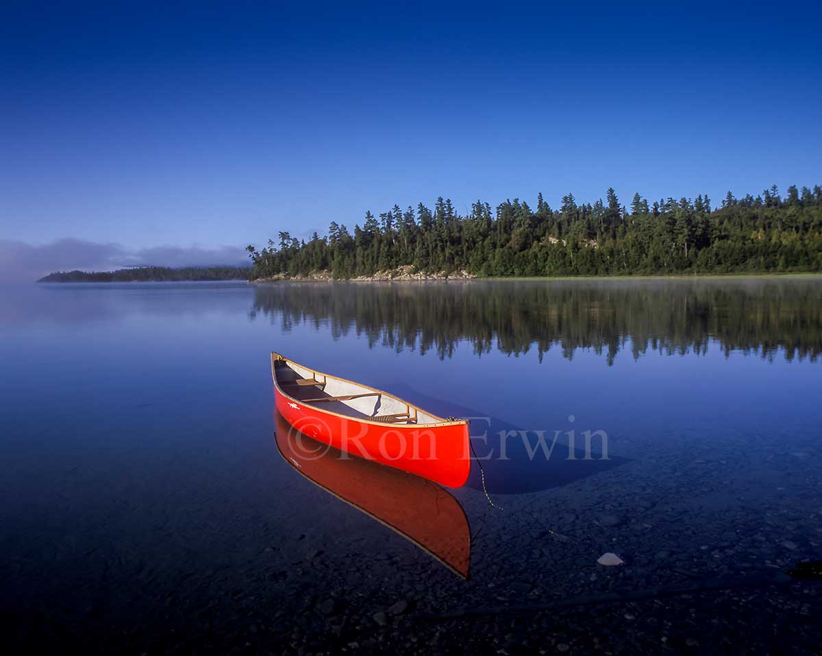 Floating Red Canoe
